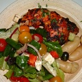 Harissa chicken with Greek salad