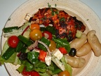 Harissa chicken with Greek salad