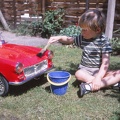 07 D washing his pedal car