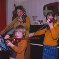 34 Playing violins with Granny