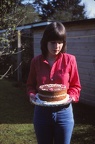 66 W with her birthday cake (18 yrs)